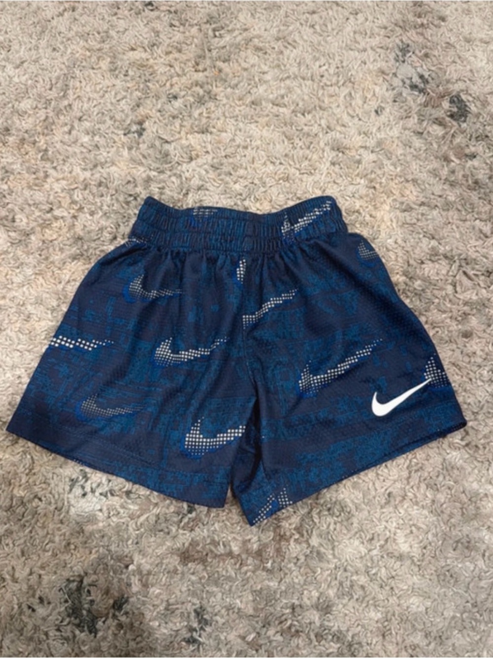 Nike Boys Navy Blue Athletic Shorts with White Swoosh